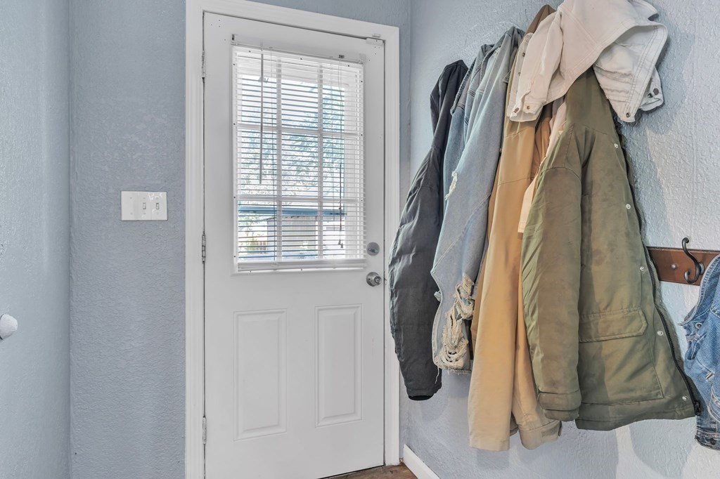 63 Freeman Terrace Springfield, MA 01104 - Photo 8 of 41 a view of walk in closet with clothes and shoes