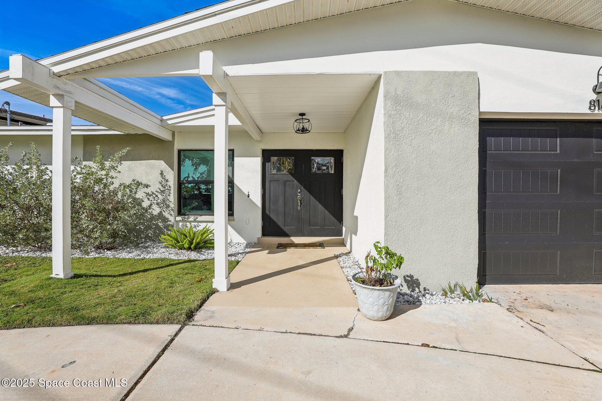 818 Cardinal Road Cocoa, FL 32926 - Photo 2 of 48 5-Frontdoor-Cardinal Rd-005