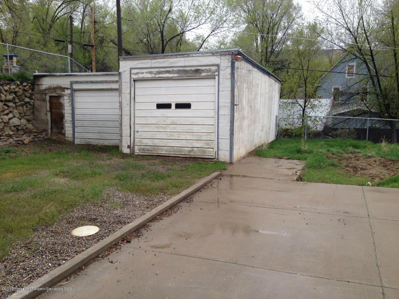 329 East 4th Street Rifle, CO 81650 - Photo 7 of 7 a view of a house with a yard
