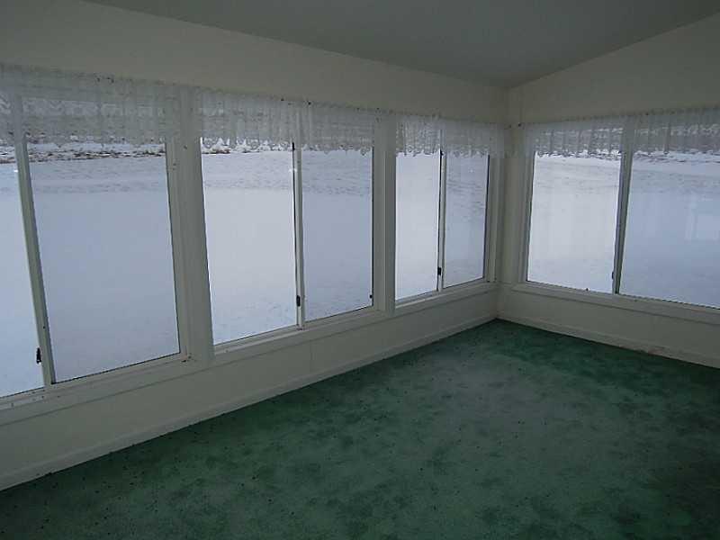 203 Academy Street Presque Isle, ME 04769 - Photo 7 of 33 Sunroom.