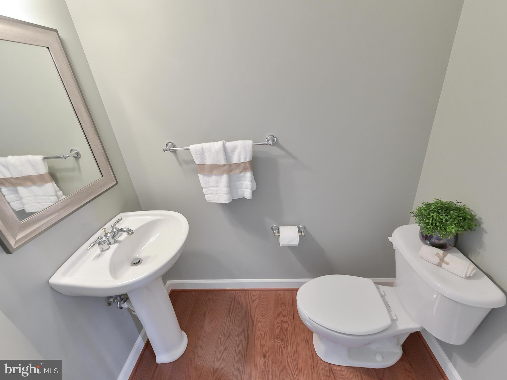 3934 Addison Woods Road Frederick, MD 21704 - Photo 15 of 41 Half bath on the main level.