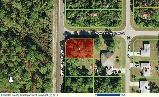 an aerial view of a house with a garden