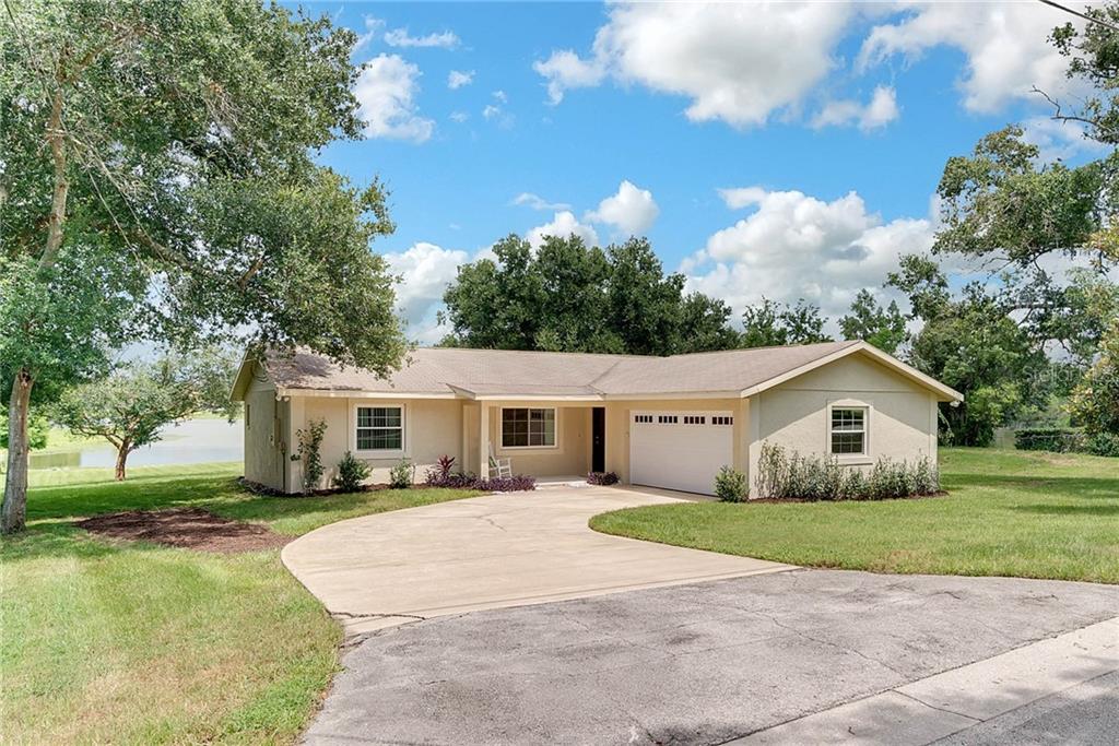 1607 Overlook Road Longwood, FL 32750 - Photo 1 of 1 Front view of 1607 Overlook Drive, Longwood, Florida! Large driveway with side entry 2 car garage!