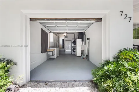 a view of a hallway with entryway