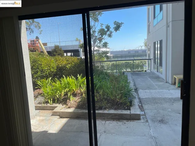 a kitchen with a sink and a refrigerator