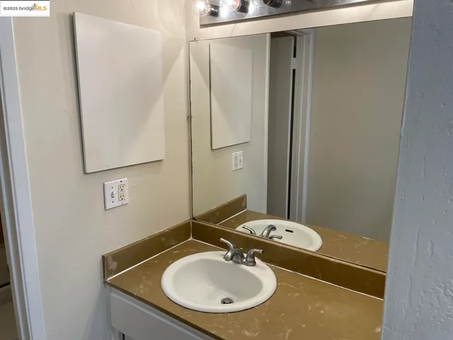 a bathroom with a shower and a toilet