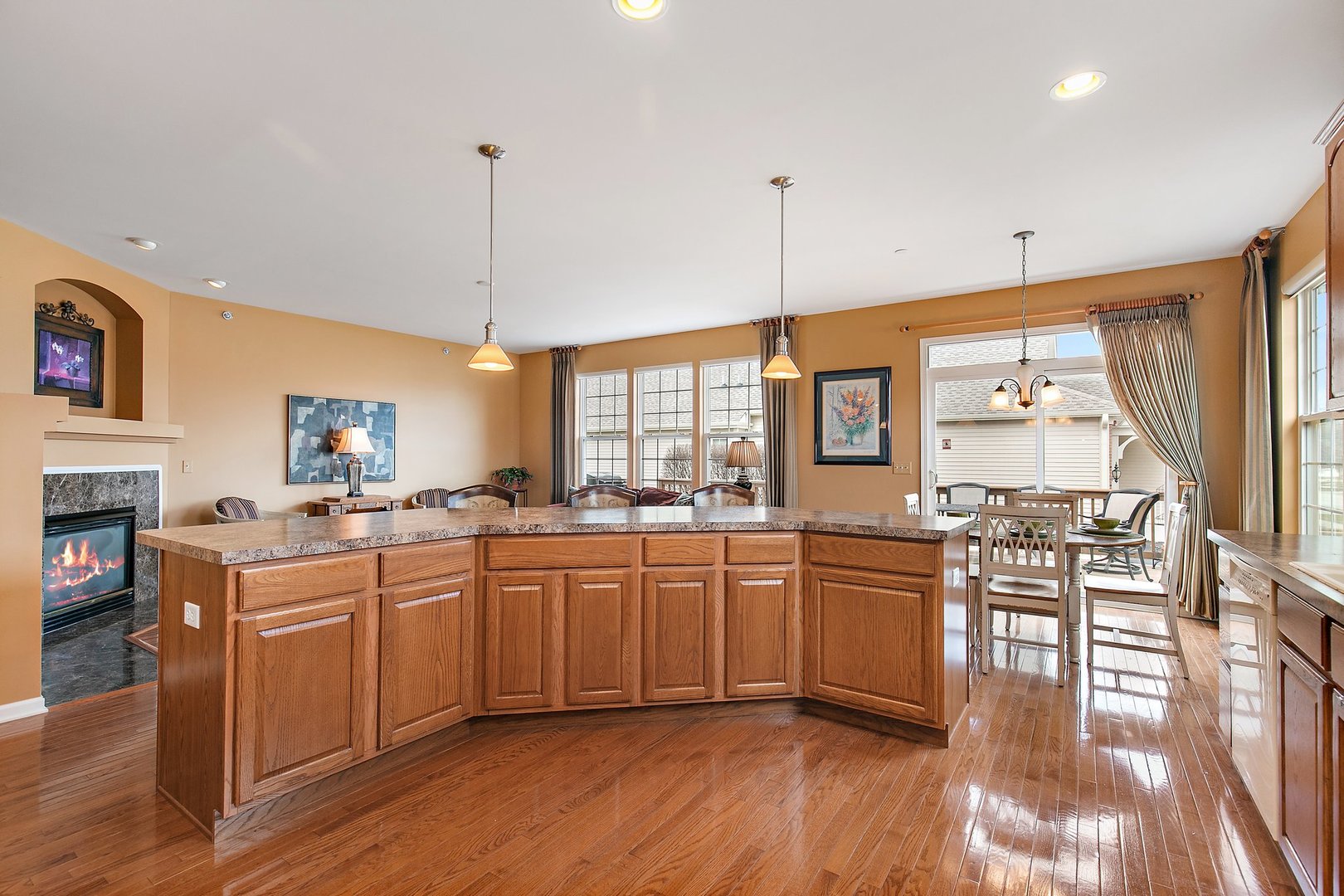 5876 Leeds Road Hoffman Estates, IL 60192 - Photo 12 of 37 a kitchen with lots of counter top space and dining table
