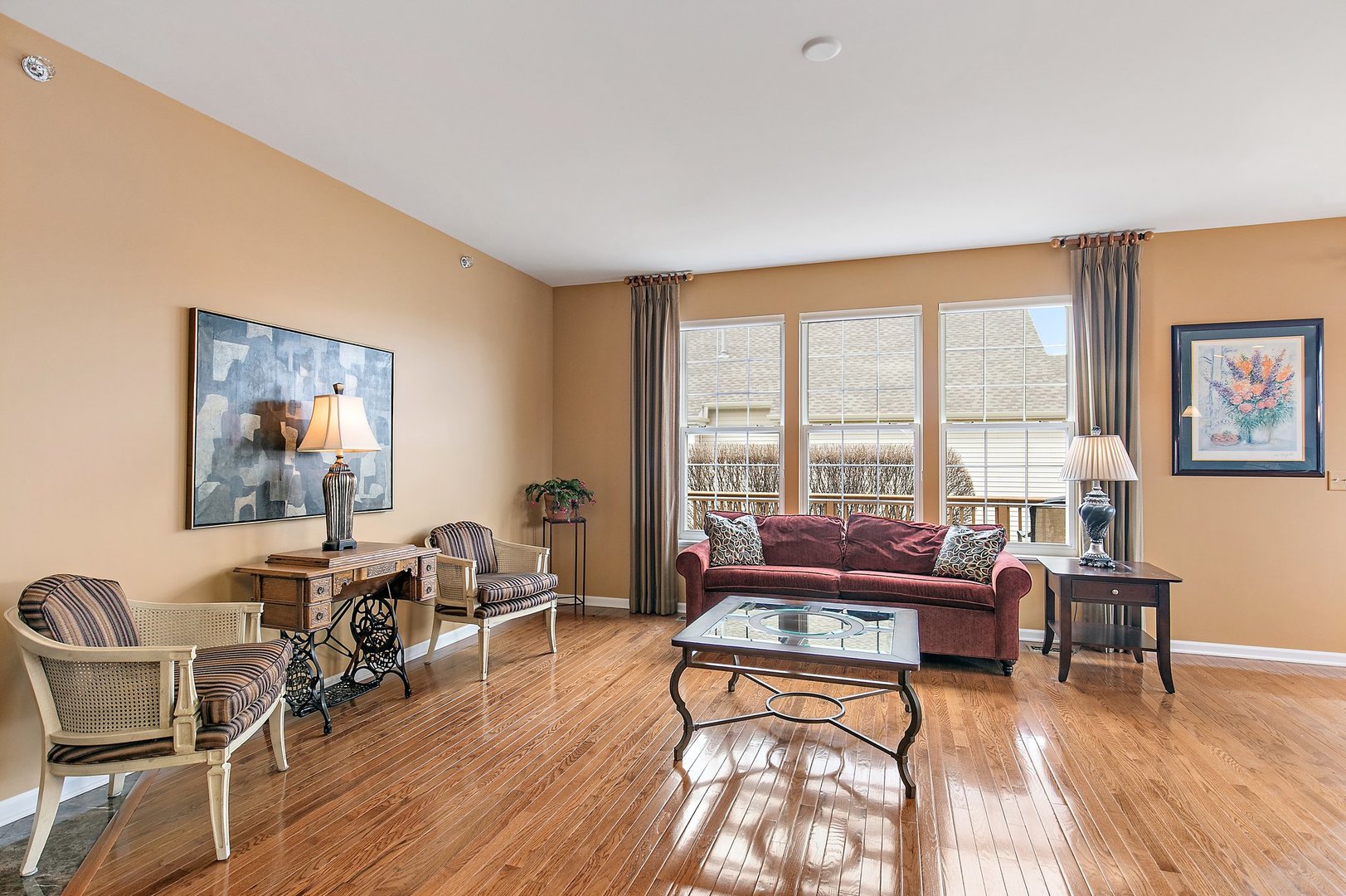 5876 Leeds Road Hoffman Estates, IL 60192 - Photo 14 of 37 a living room with furniture and a large window