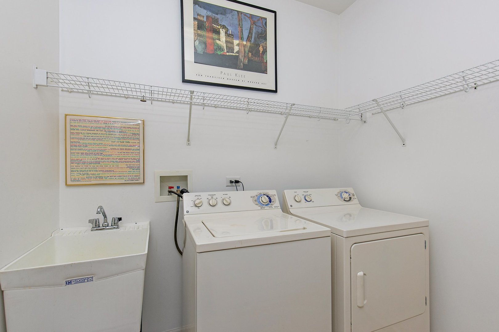 5876 Leeds Road Hoffman Estates, IL 60192 - Photo 21 of 37 a utility room with dryer and washer