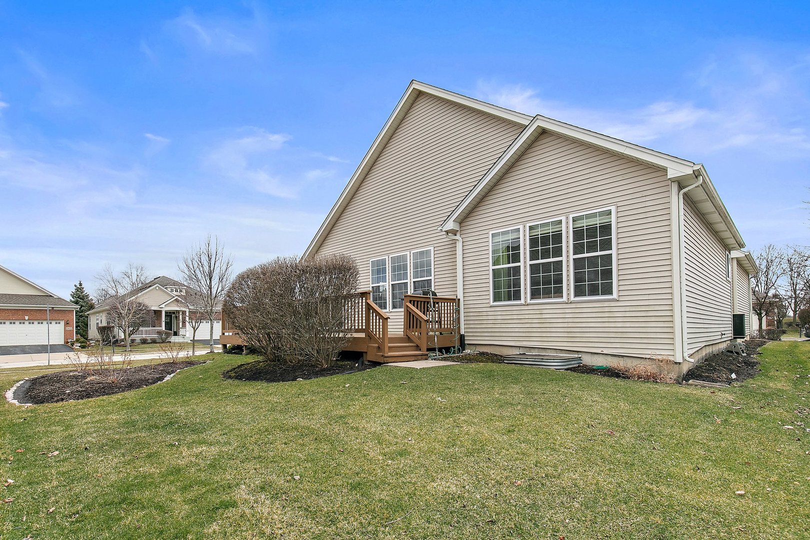 5876 Leeds Road Hoffman Estates, IL 60192 - Photo 24 of 37 a house view with a garden space