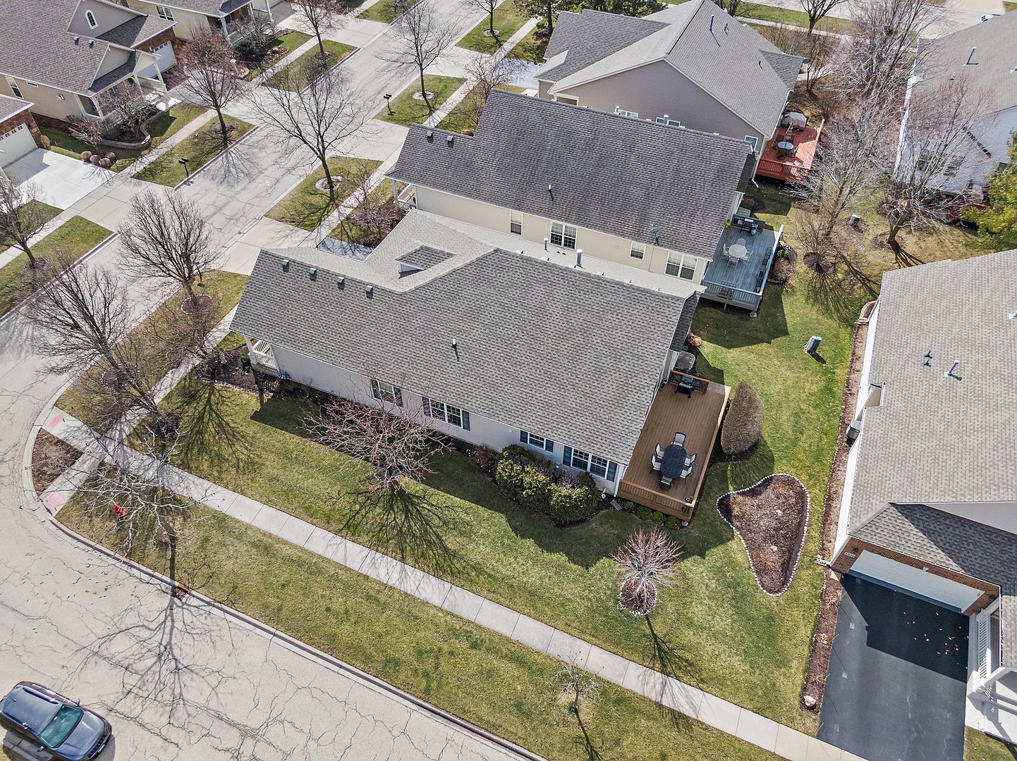 5876 Leeds Road Hoffman Estates, IL 60192 - Photo 27 of 37 an aerial view of a house with a garden and lake view