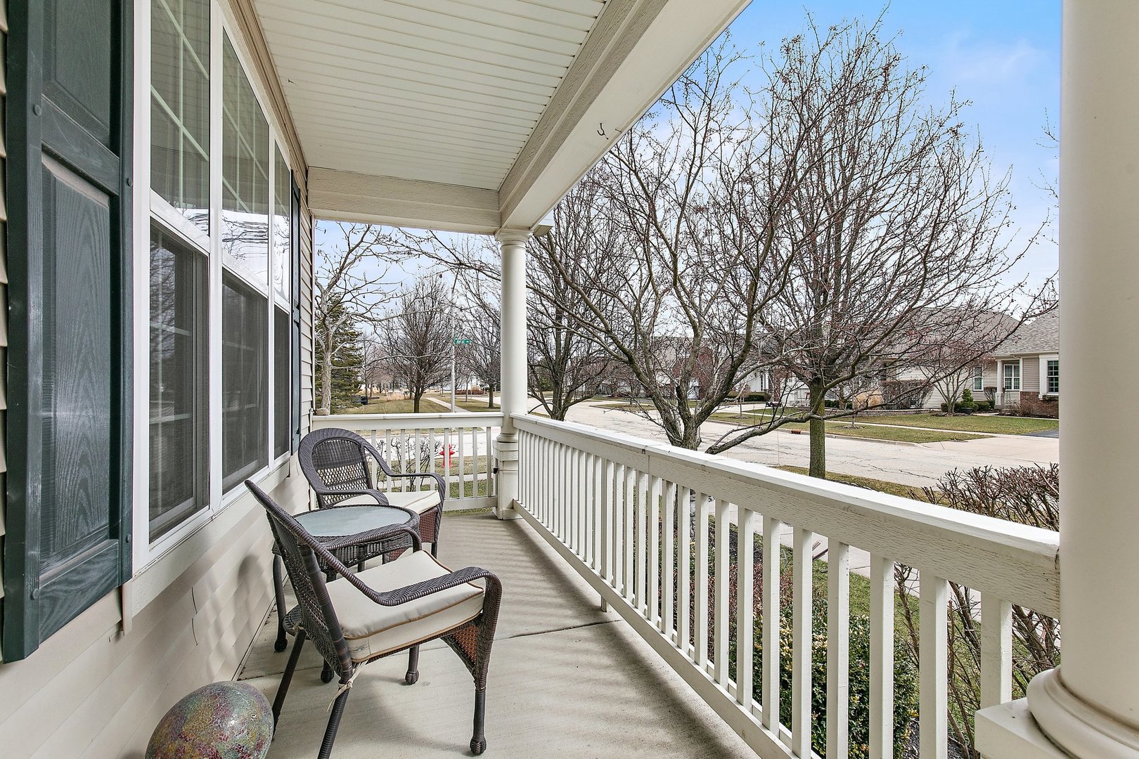 5876 Leeds Road Hoffman Estates, IL 60192 - Photo 3 of 37 a view of a two chairs and table in the balcony