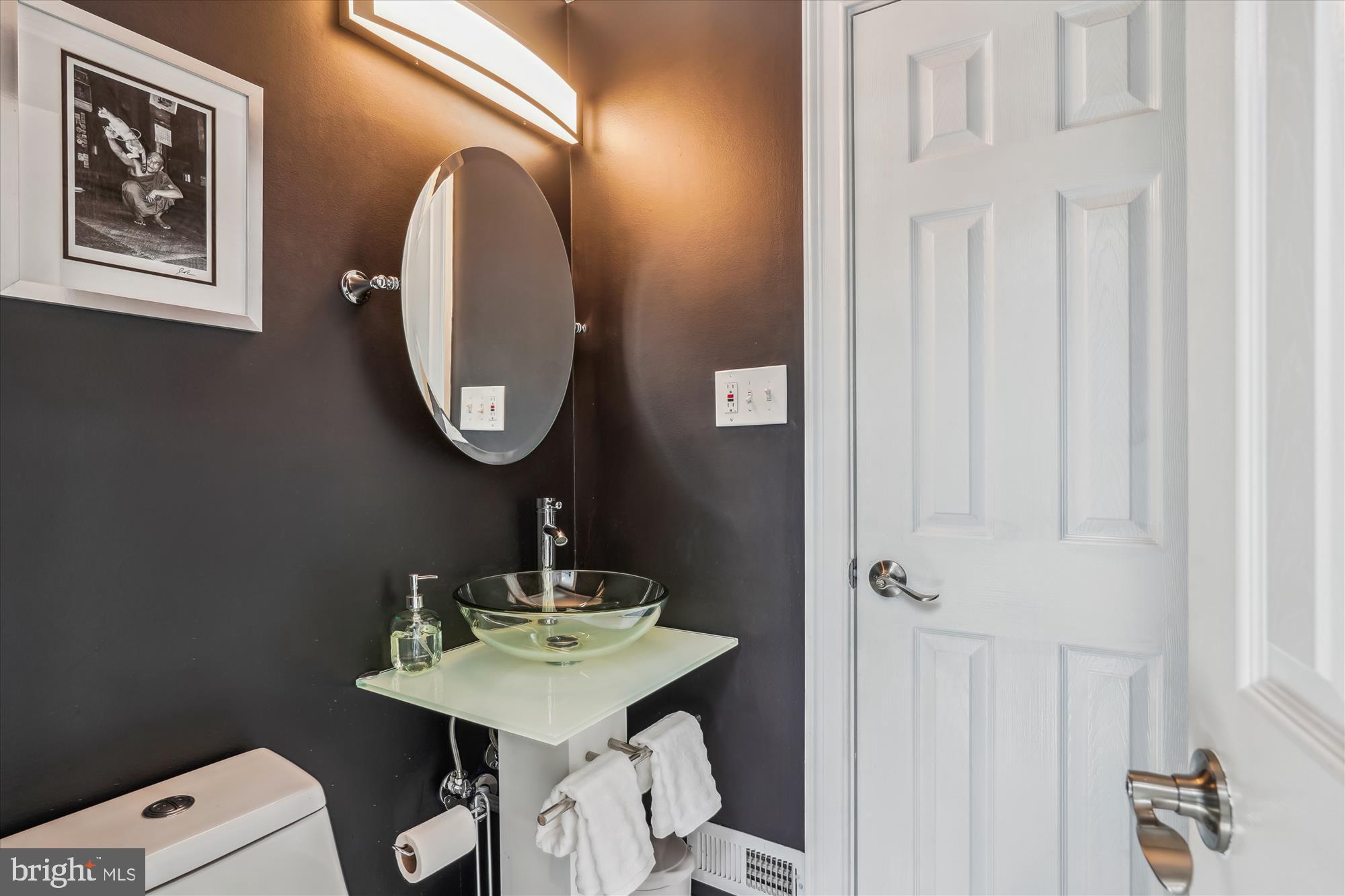 5308 Crown Point Road Burke, VA 22015 - Photo 28 of 75 Dual entry into the main level, modern half bath