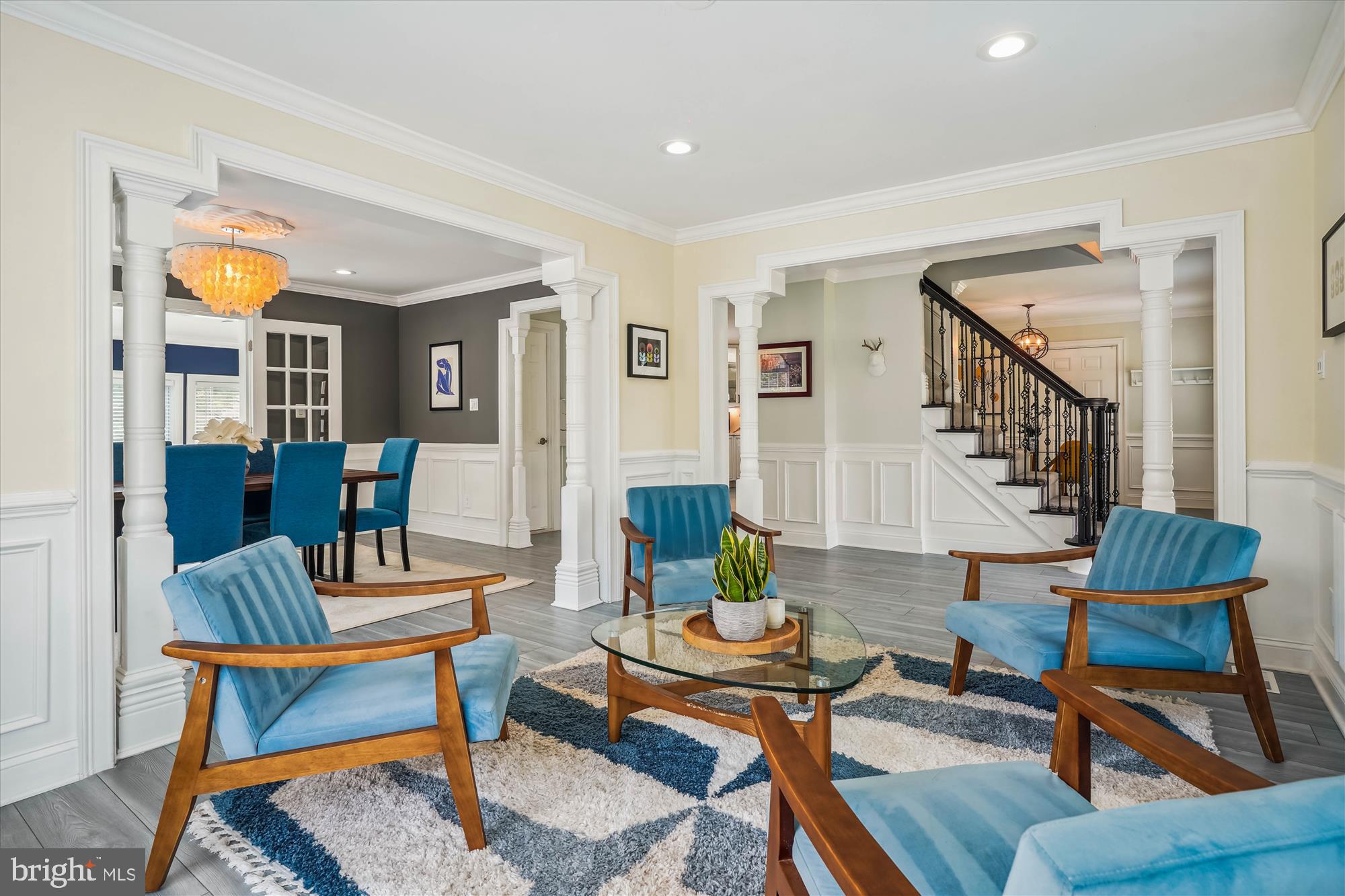 5308 Crown Point Road Burke, VA 22015 - Photo 6 of 75 Elegant details include crown molding, chair rail