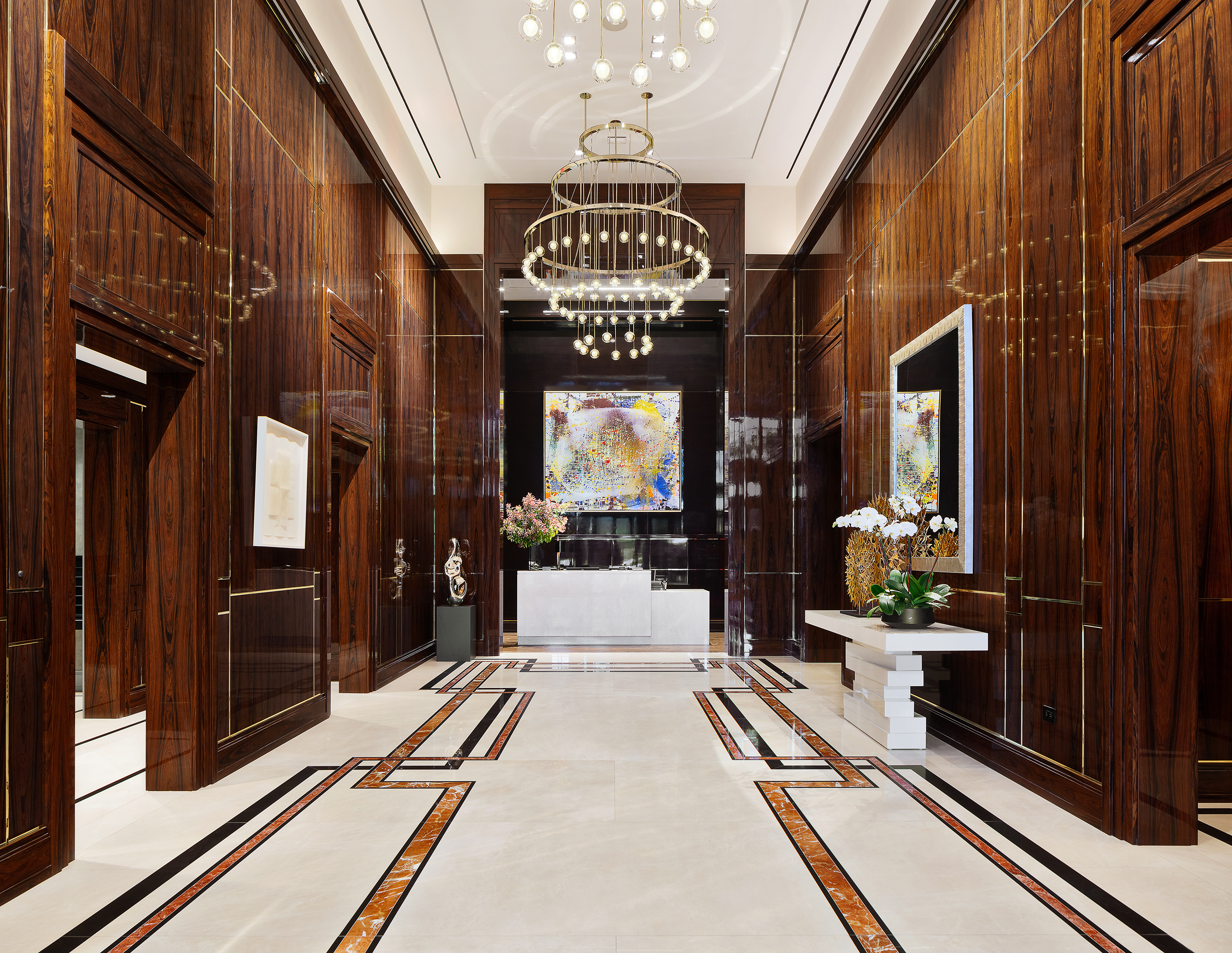 200 East 95th Street, Unit 15A Manhattan, NY 10128 - Photo 17 of 25 a lobby with furniture and a potted plant