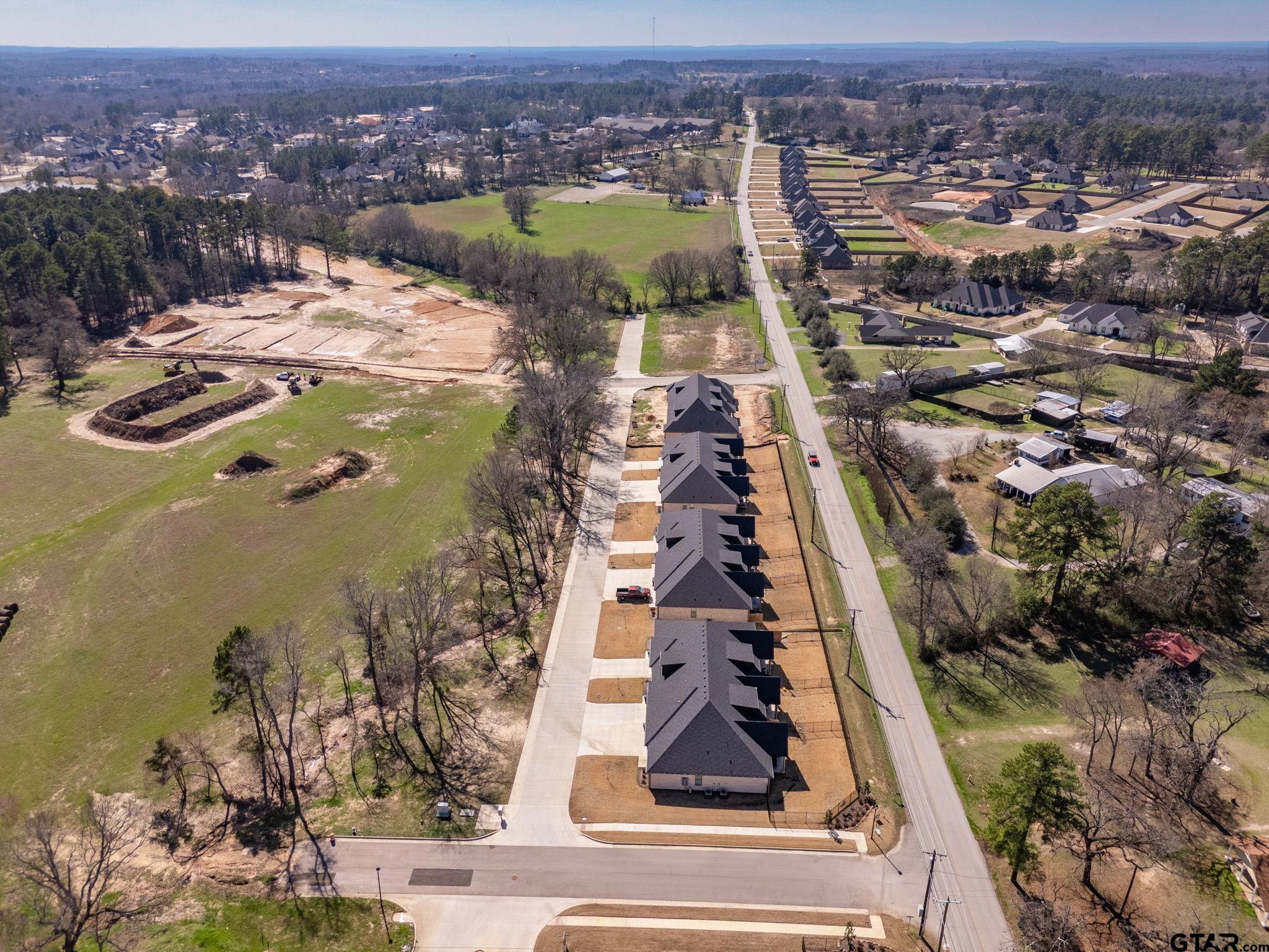 2404 Flint River Road Tyler, TX 75703 - Photo 4 of 4 an aerial view of residential houses with outdoor space