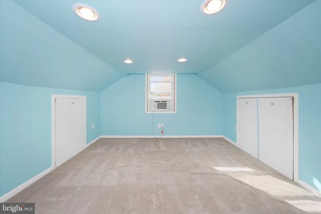 a view of a room with lots of wooden floor