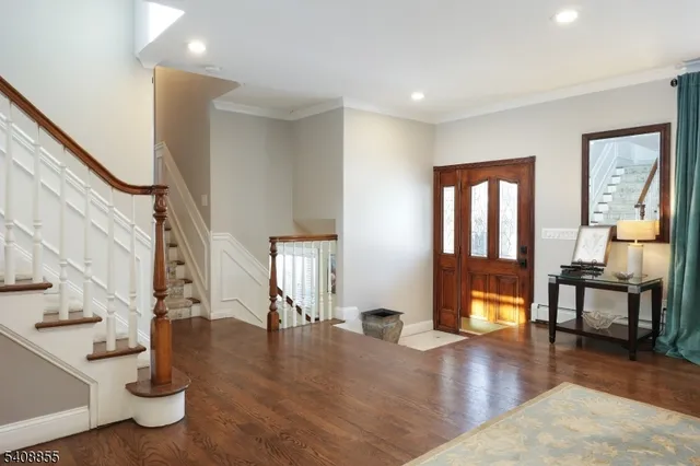 a large kitchen with a table and chairs