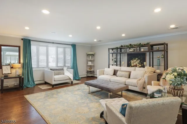 a kitchen with stainless steel appliances a stove sink microwave and cabinets