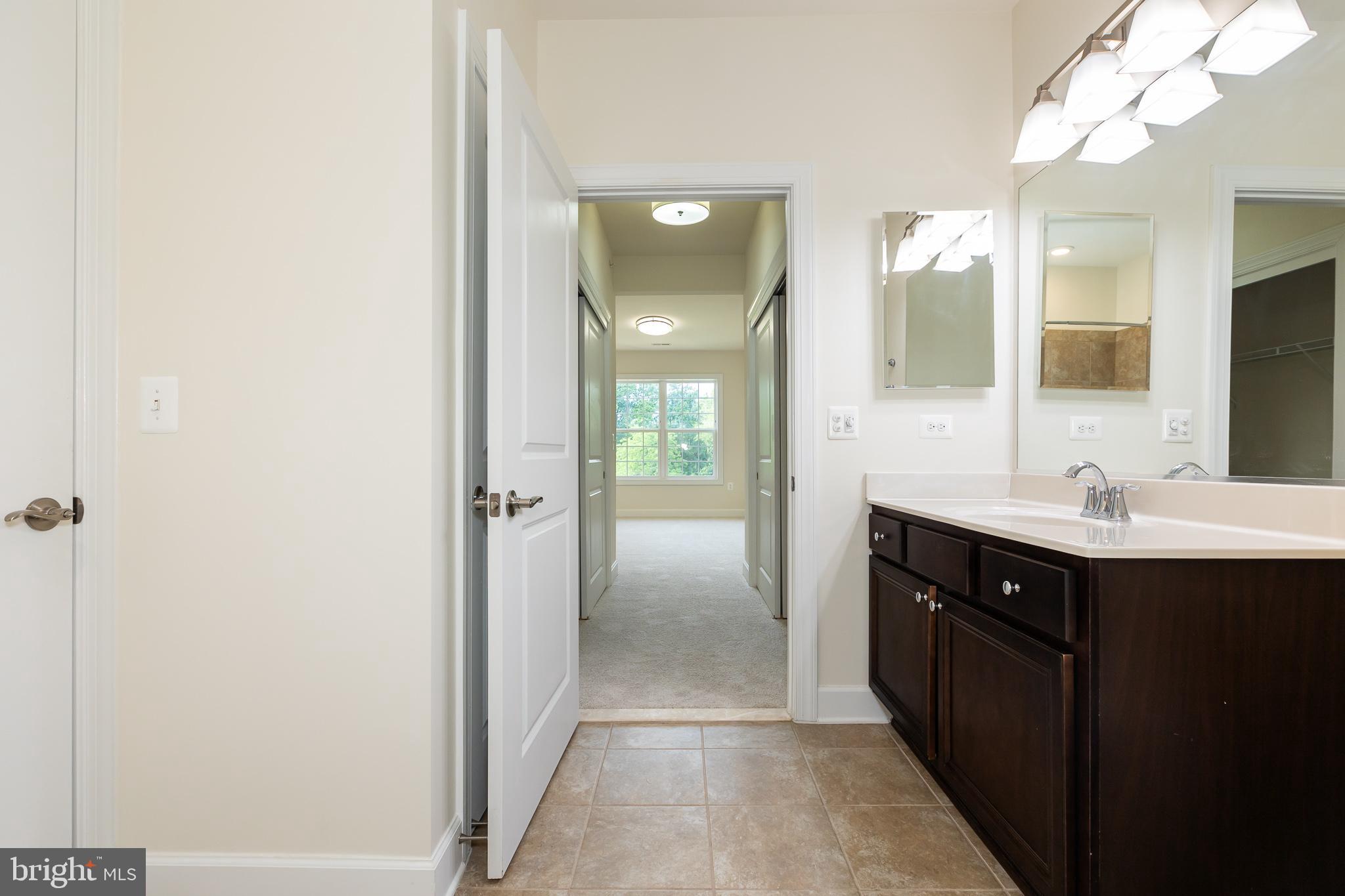 10530 Resort Road, Unit 306 Ellicott City, MD 21042 - Photo 44 of 54 Full bathroom connected to 2nd master suite
