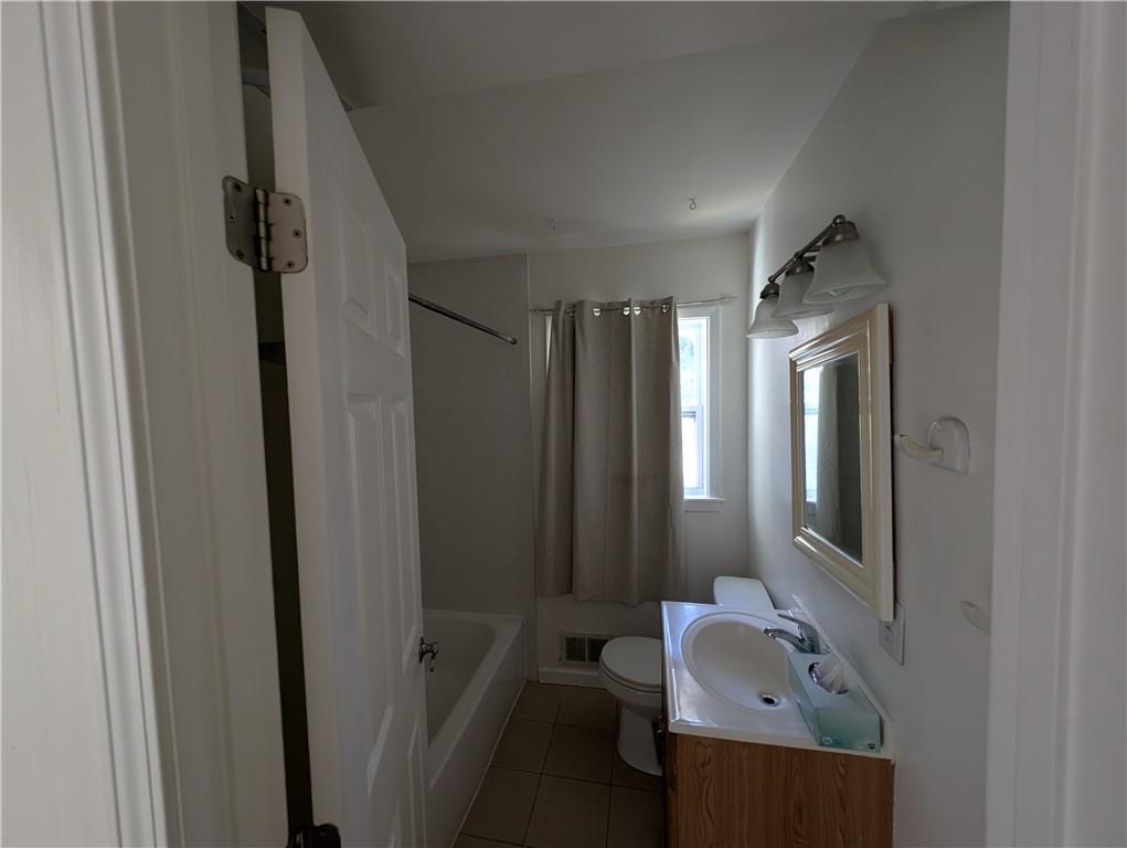 4328 Rockbridge Road Southwest Stone Mountain, GA 30083 - Photo 11 of 16 a bathroom with a sink toilet and shower