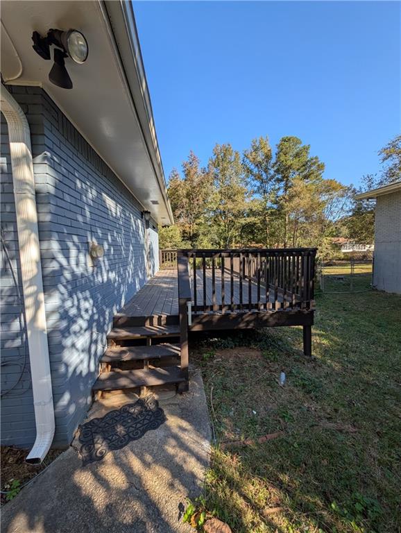 4328 Rockbridge Road Southwest Stone Mountain, GA 30083 - Photo 12 of 16 a view of a backyard with sitting area