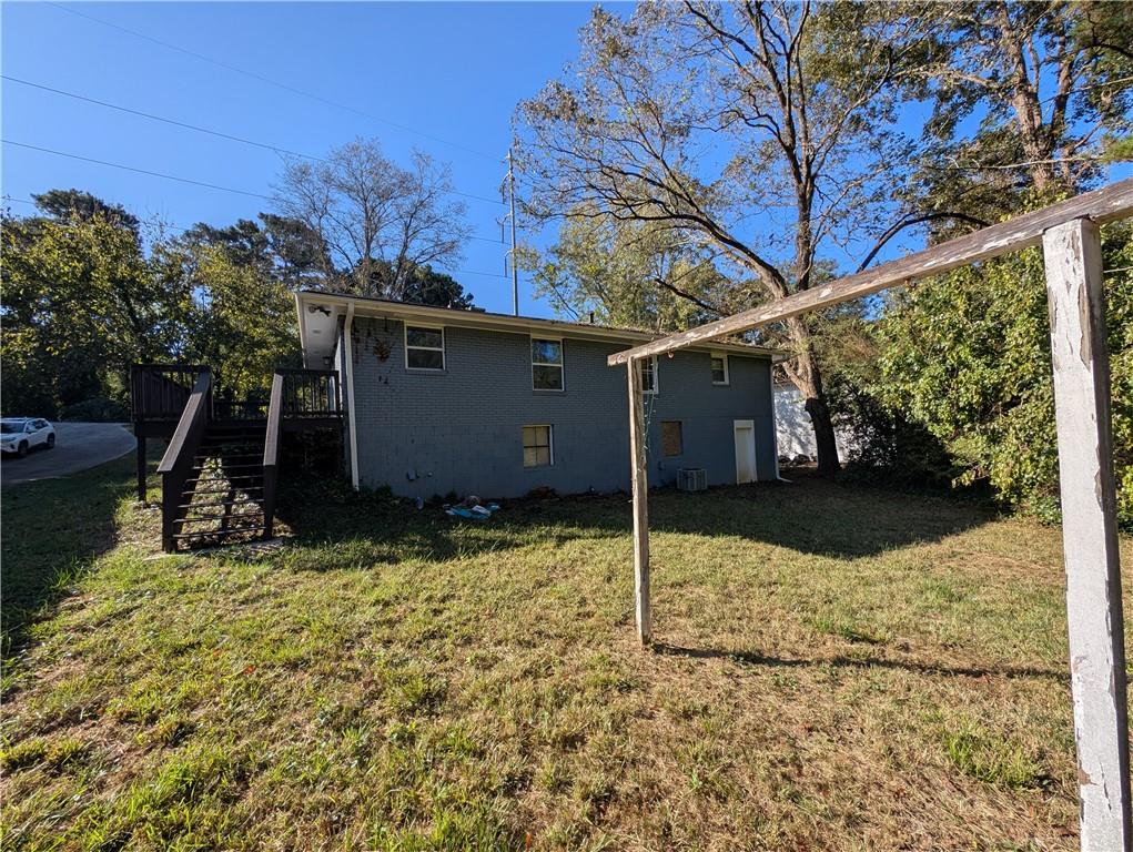 4328 Rockbridge Road Southwest Stone Mountain, GA 30083 - Photo 14 of 16 a view of a backyard