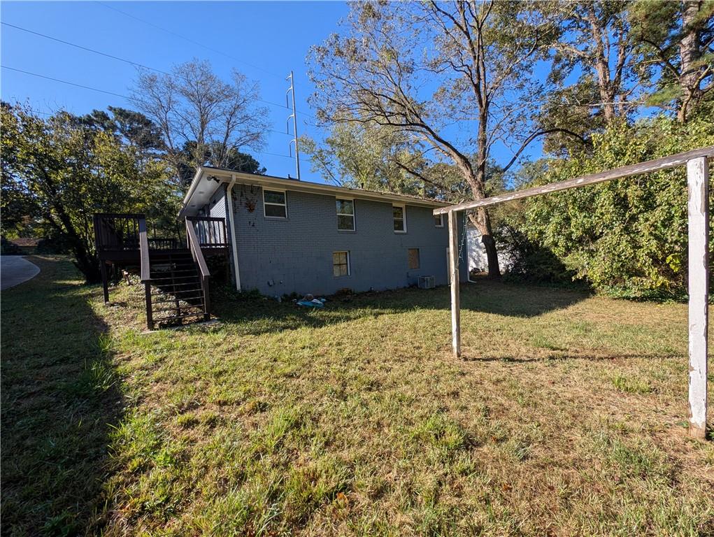 4328 Rockbridge Road Southwest Stone Mountain, GA 30083 - Photo 15 of 16 a view of a backyard