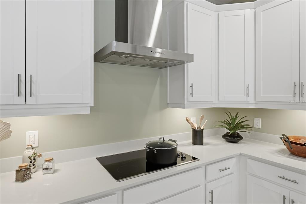 7153 Inlet Isles Lakewood Ranch, FL 34202 - Photo 11 of 26 a kitchen with a sink and cabinets
