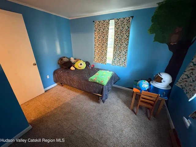 a room with furniture and a window