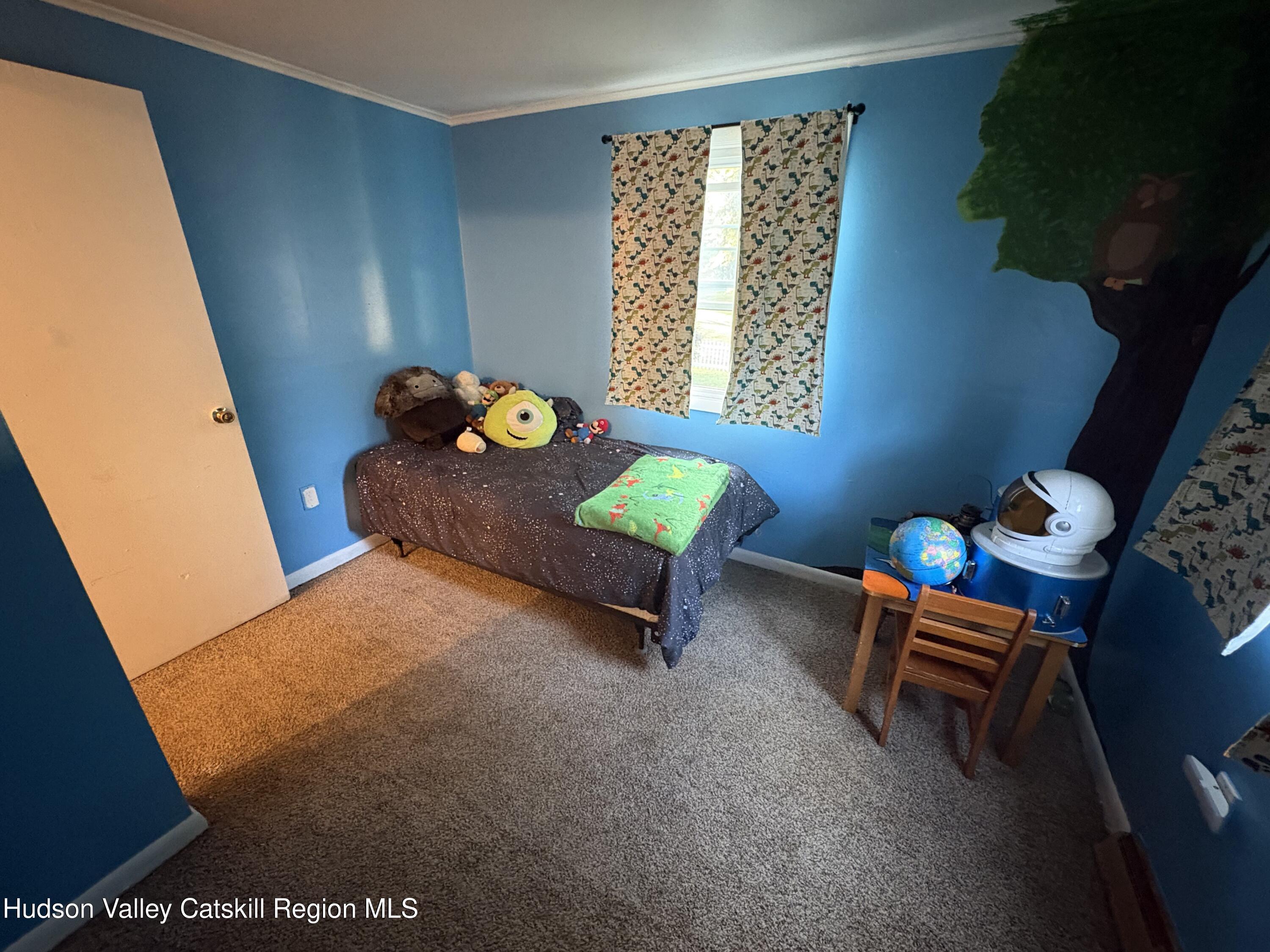 19 Rivenburg Lane Hudson, NY 12534 - Photo 17 of 28 a room with furniture and a window