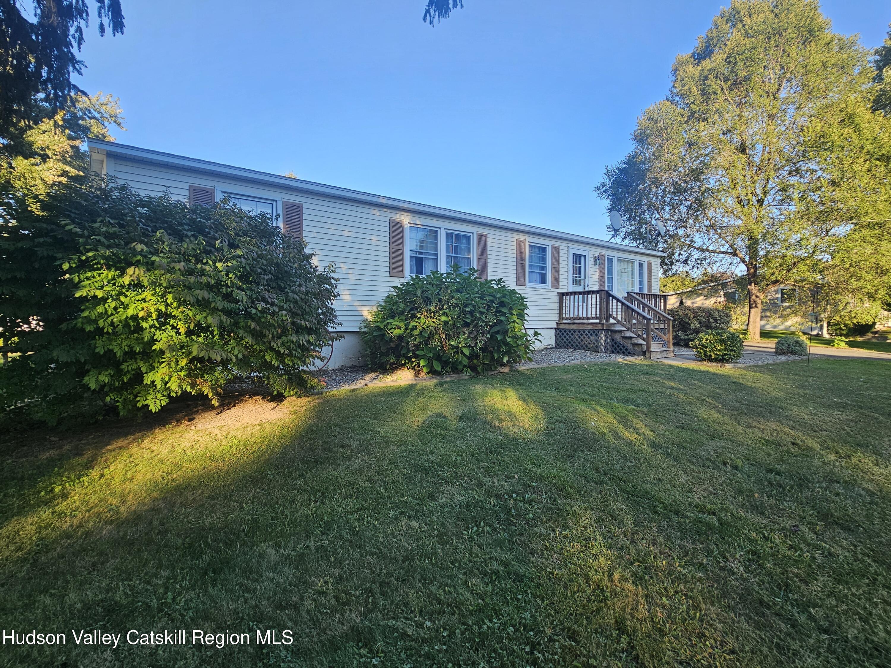19 Rivenburg Lane Hudson, NY 12534 - Photo 2 of 28 a view of a house with a garden