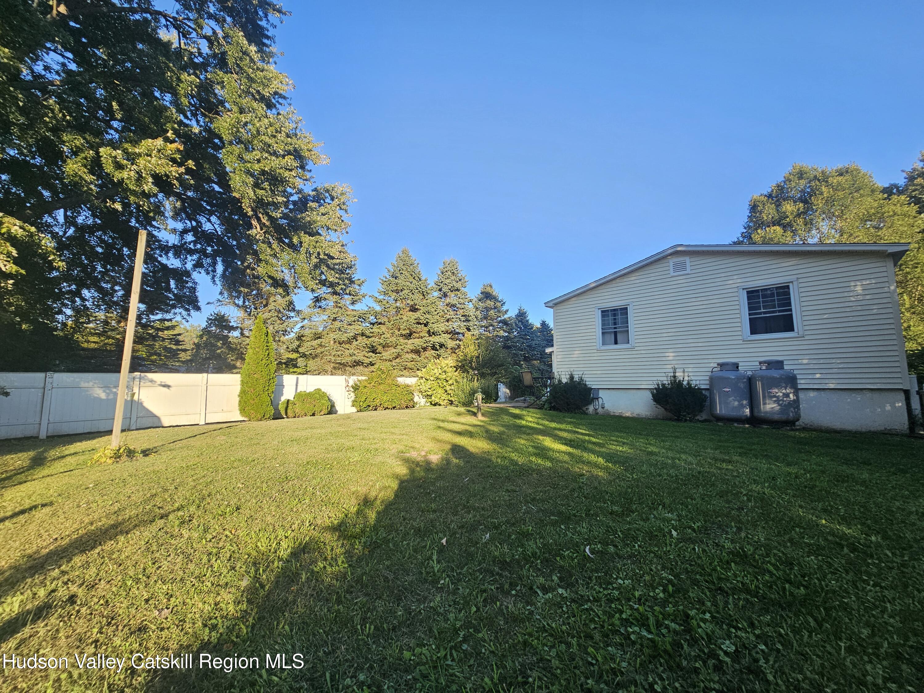 19 Rivenburg Lane Hudson, NY 12534 - Photo 24 of 28 a view of a house with a backyard