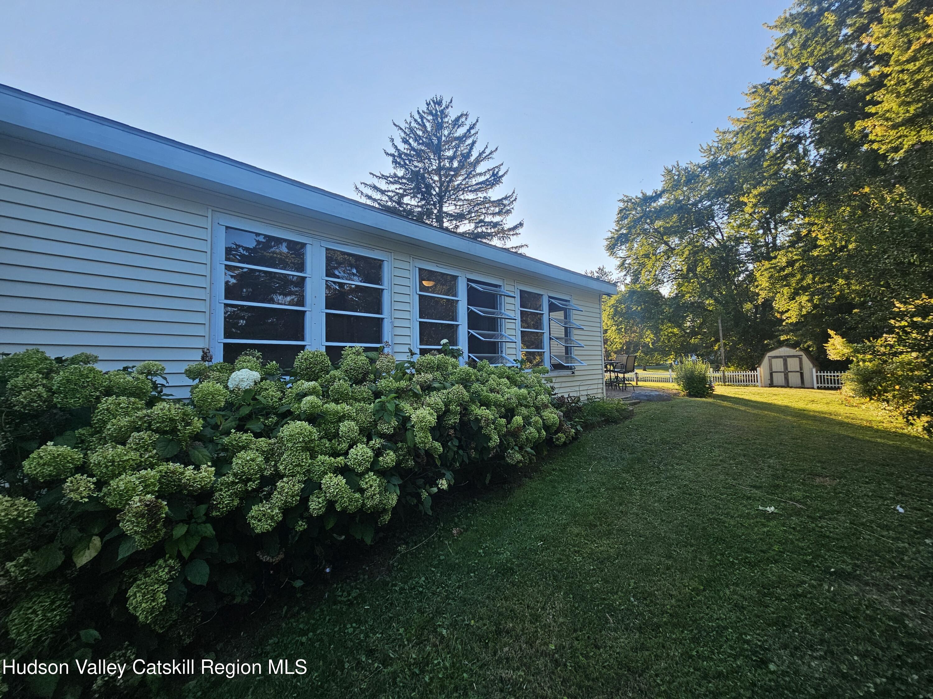 19 Rivenburg Lane Hudson, NY 12534 - Photo 26 of 28 a view of a house with garden and trees
