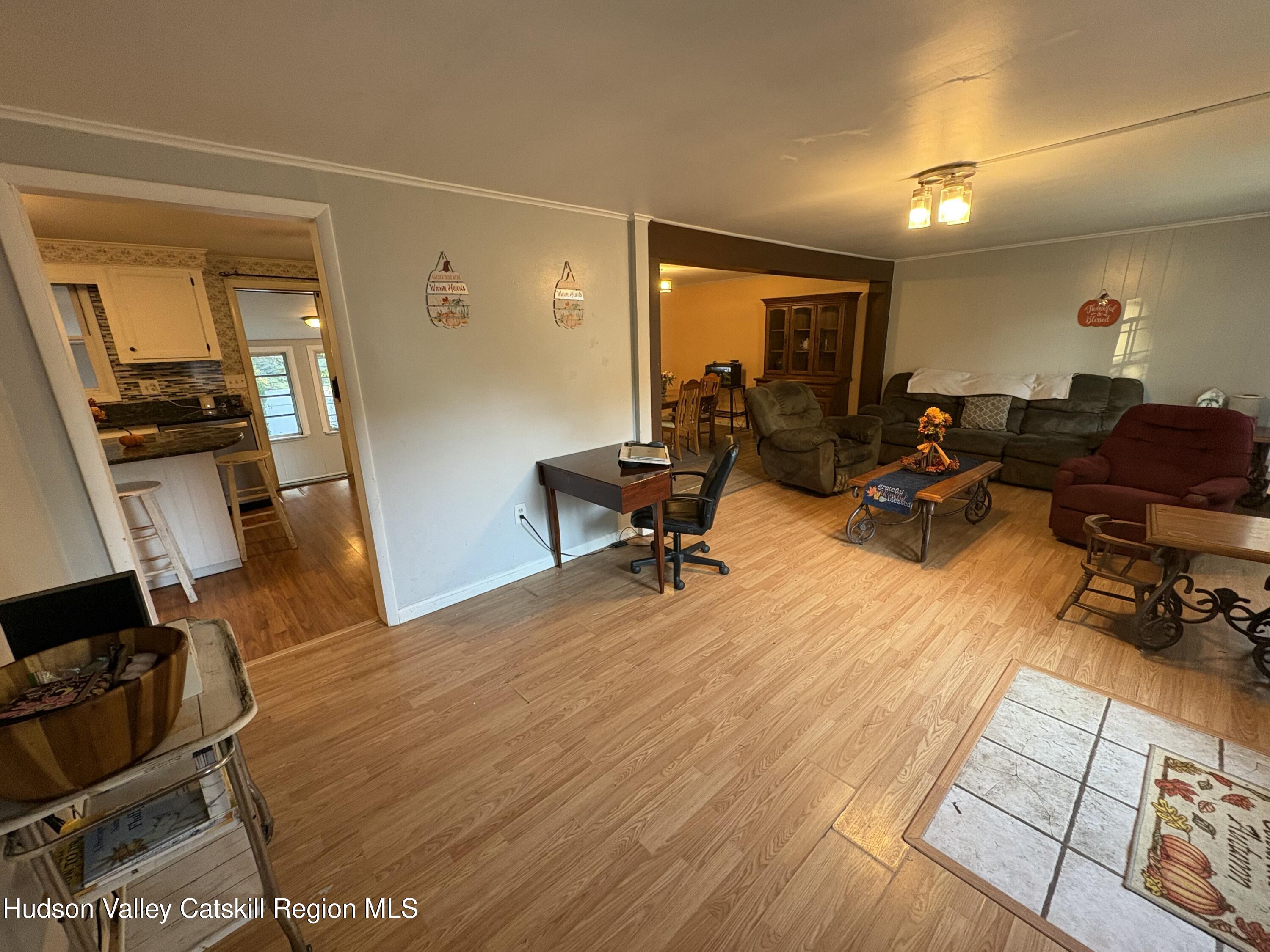 19 Rivenburg Lane Hudson, NY 12534 - Photo 5 of 28 a room with furniture and wooden floor