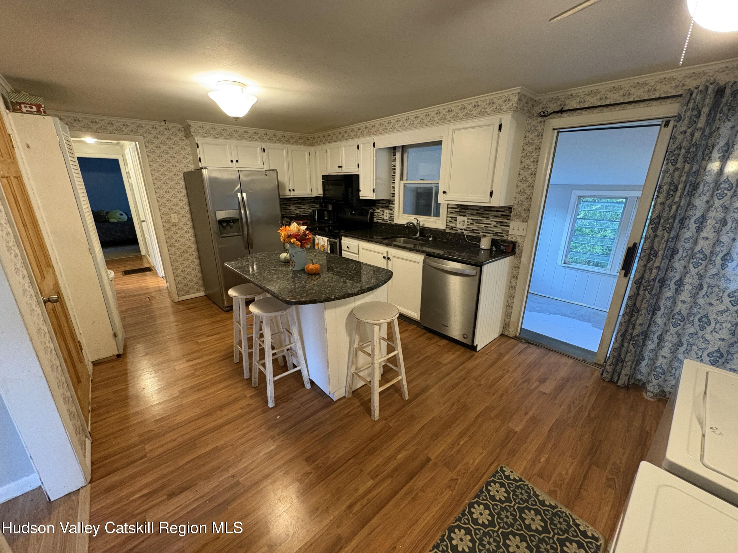 19 Rivenburg Lane Hudson, NY 12534 - Photo 10 of 28 a kitchen with a sink appliances and cabinets