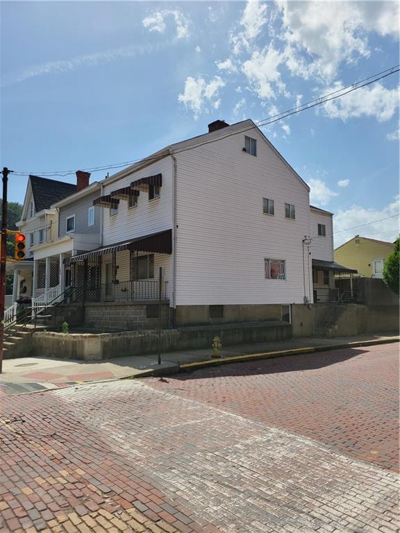 125 Butler Street Pittsburgh, PA 15209 - Photo 1 of 24 a view of a house with a yard