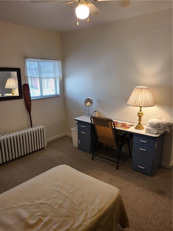 125 Butler Street Pittsburgh, PA 15209 - Photo 16 of 24 a bedroom with a bed and a lamp