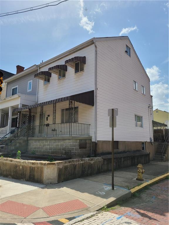 125 Butler Street Pittsburgh, PA 15209 - Photo 23 of 24 a front view of a house with garage