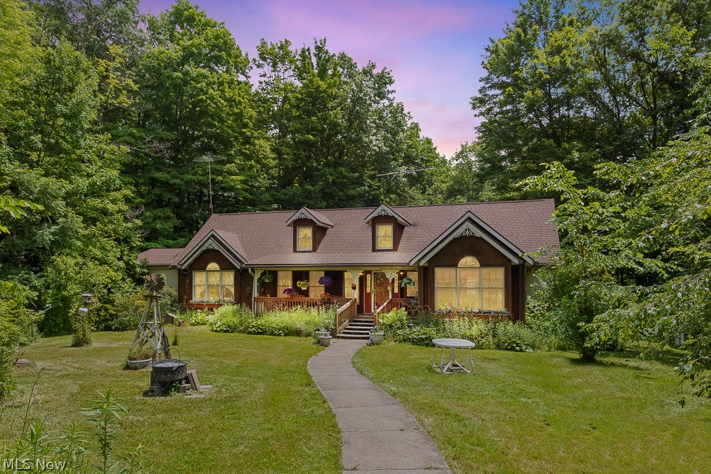 9712 Nichols Road Windham, OH 44288 - Photo 1 of 50 View of front of home featuring a lawn