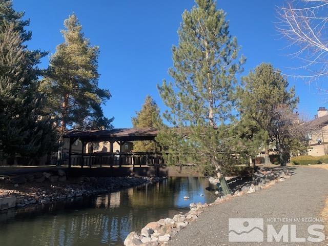 4480 Matich Drive Reno, NV 89502 - Photo 18 of 21 a view of house with yard and lake view