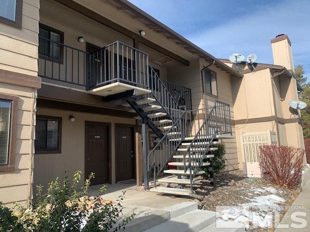 4480 Matich Drive Reno, NV 89502 - Photo 2 of 21 a view of a house with more windows and flower plants