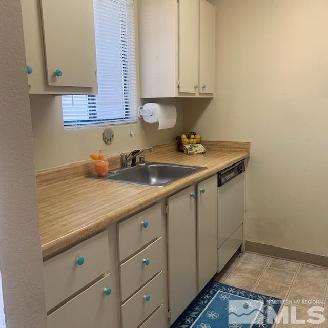 4480 Matich Drive Reno, NV 89502 - Photo 4 of 21 a kitchen with a sink and cabinets