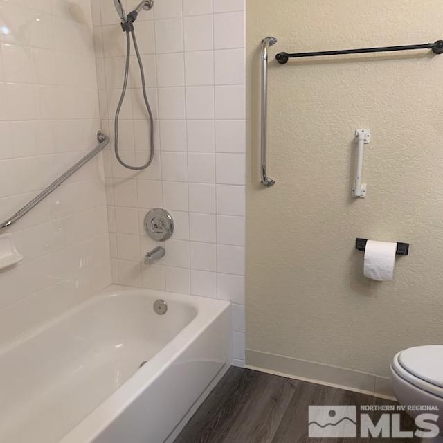 4480 Matich Drive Reno, NV 89502 - Photo 9 of 21 a bathroom with a bath tub with a shower