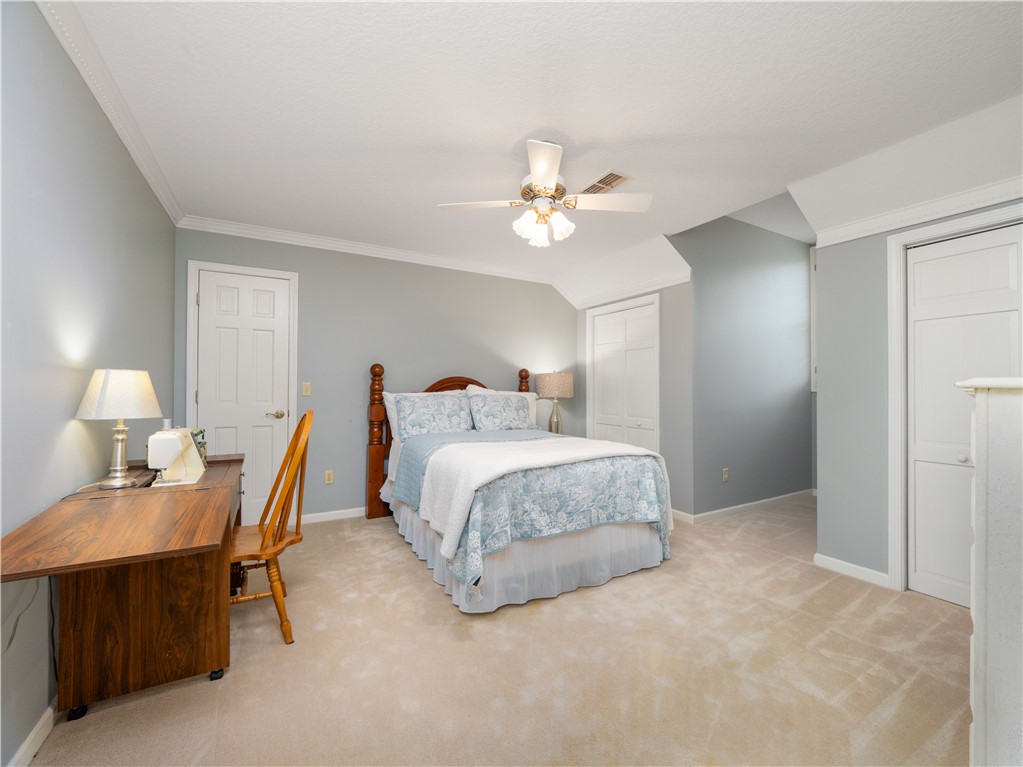 202 Chesser Lane Folkston, GA 31537 - Photo 35 of 76 Bedroom 3 with walk-in attic storage