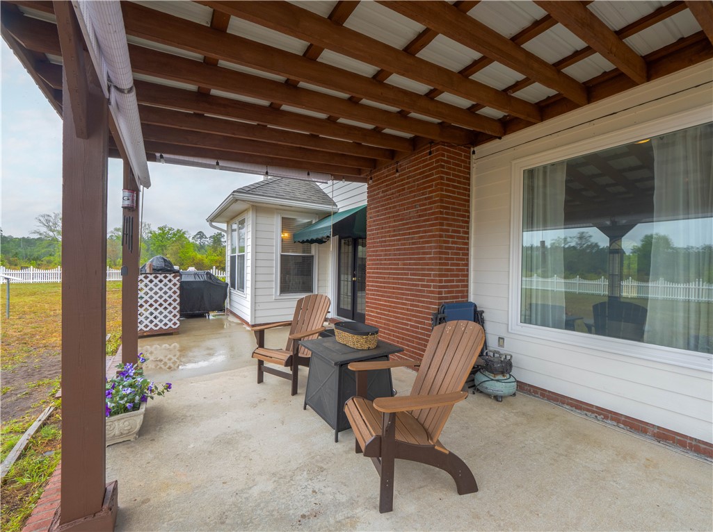 202 Chesser Lane Folkston, GA 31537 - Photo 45 of 76 Covered Back Porch