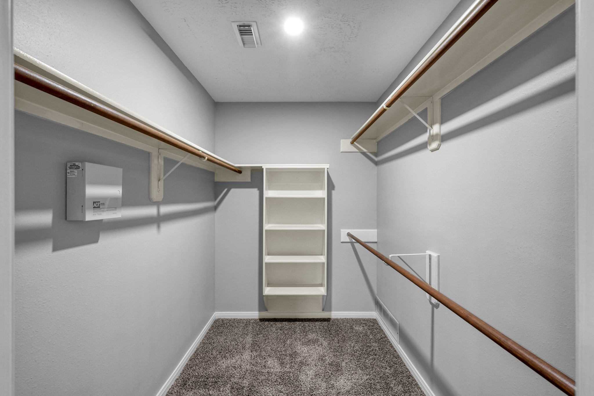 3406 Hartfield Lane Spring, TX 77388 - Photo 21 of 44 a view of an empty walk in closet