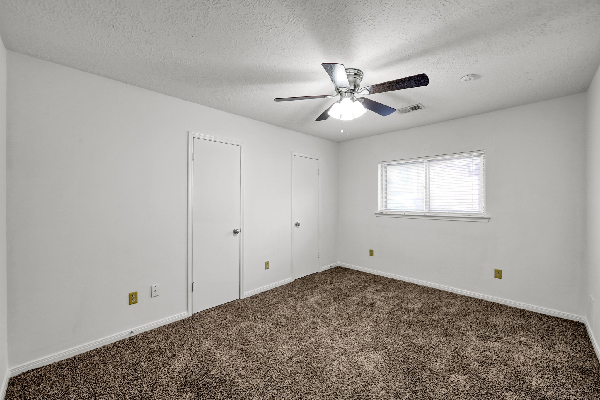 3406 Hartfield Lane Spring, TX 77388 - Photo 23 of 44 a view of empty room with ceiling fan