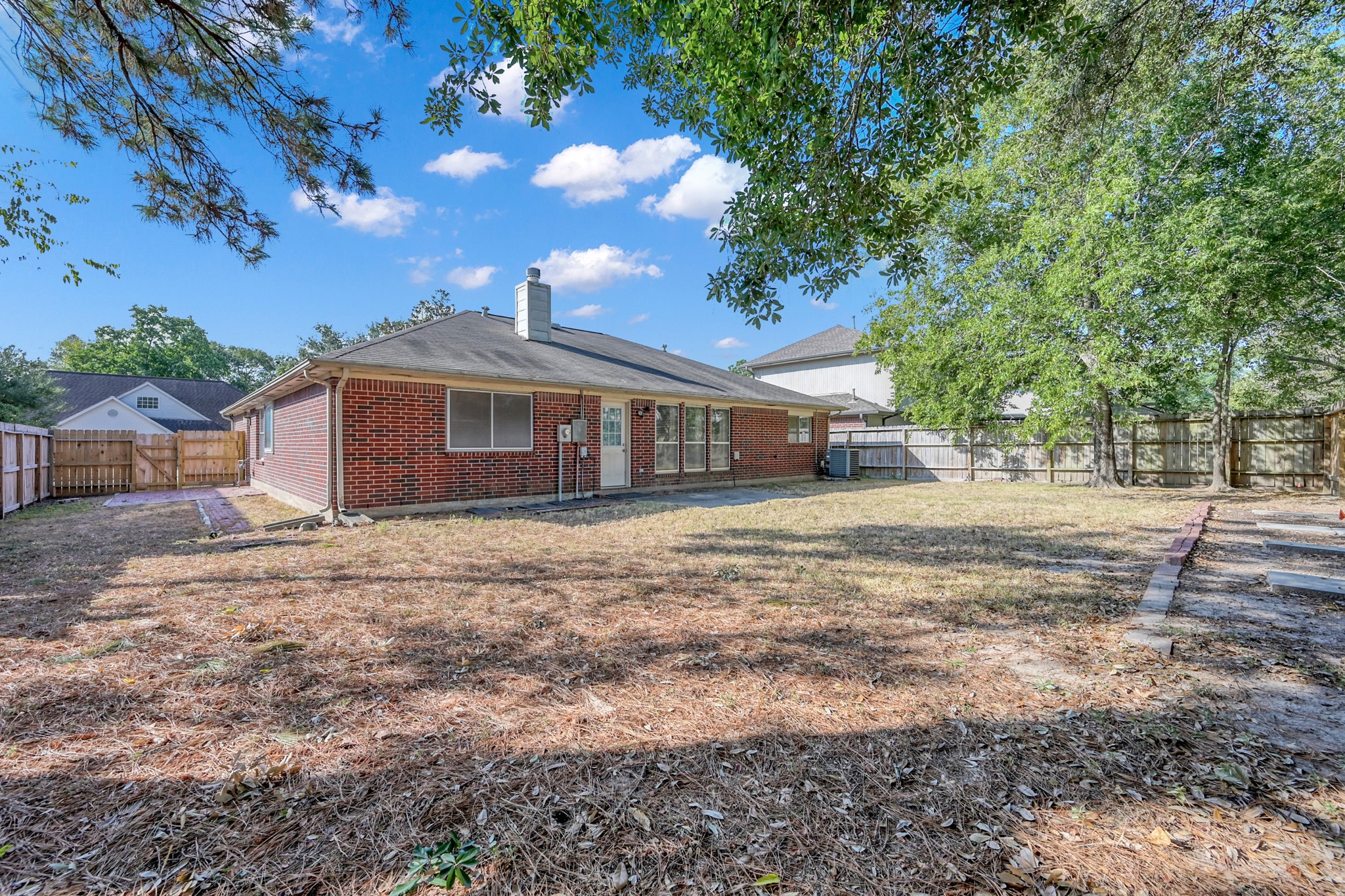 3406 Hartfield Lane Spring, TX 77388 - Photo 29 of 44 a front view of a house with a yard