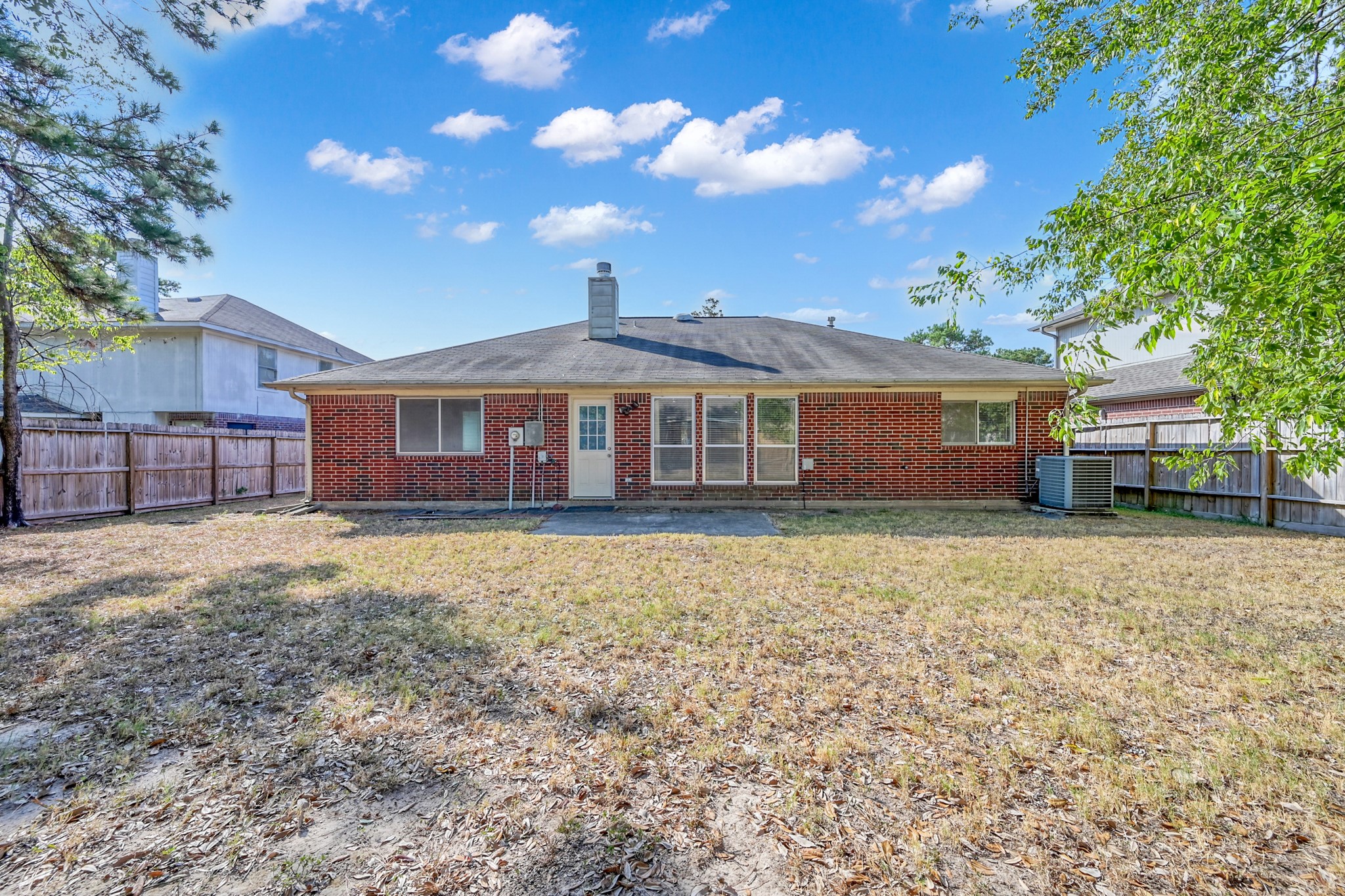 3406 Hartfield Lane Spring, TX 77388 - Photo 30 of 44 a front view of a house with a garden